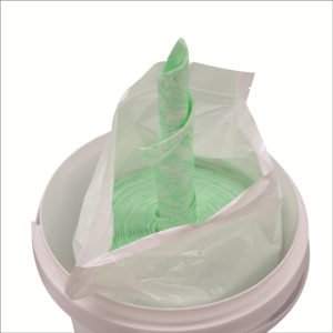 Canister packing textured wipes for industrial cleaning