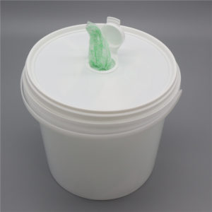 Canister packing textured wipes for industrial cleaning